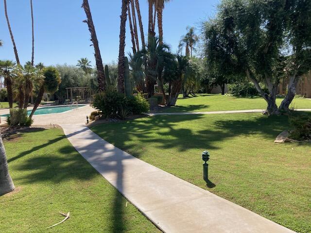 45760 Pima Road Indian Wells, CA 92210 - Photo 27 of 28 a view of a swimming pool with a yard