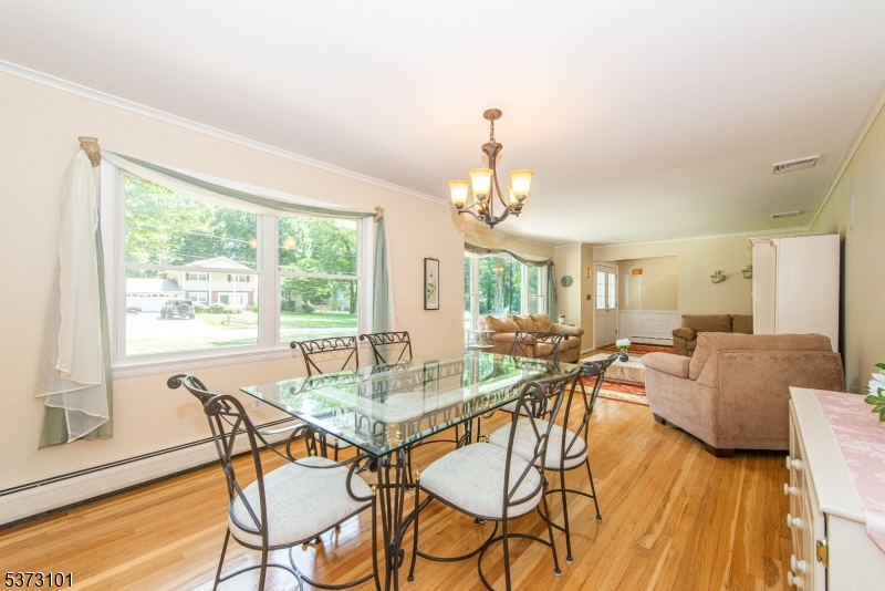 10 Campo Road Randolph, NJ 07869 - Photo 12 of 49 a view of a dining room with furniture window and wooden floor