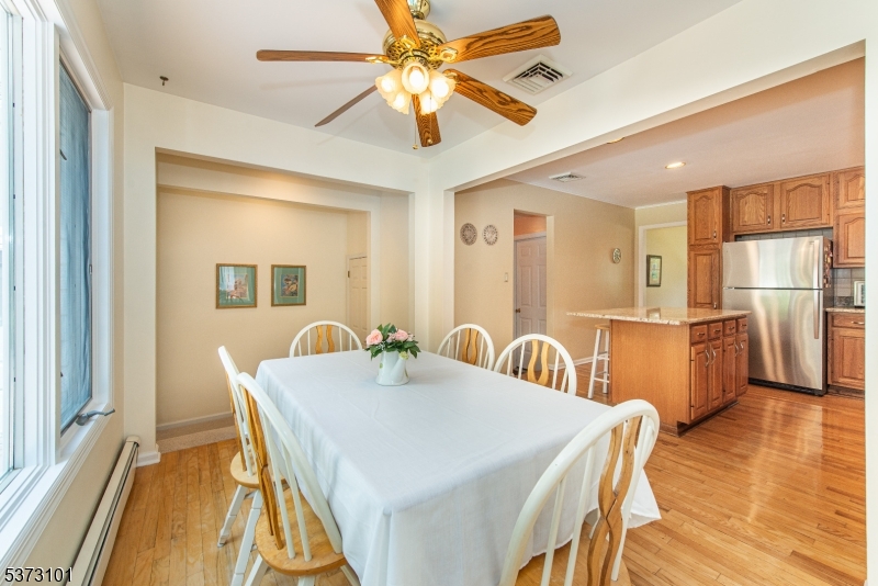 10 Campo Road Randolph, NJ 07869 - Photo 17 of 49 a view of a dining room with furniture and wooden floor