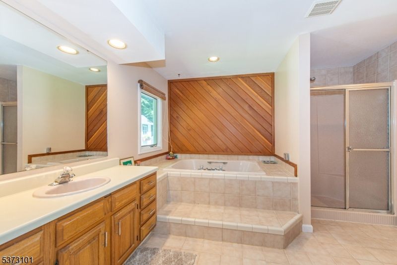 10 Campo Road Randolph, NJ 07869 - Photo 26 of 49 a bathroom with a double vanity sink mirror and