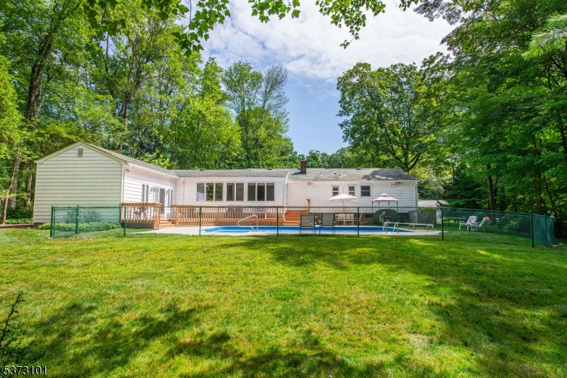 10 Campo Road Randolph, NJ 07869 - Photo 34 of 49 a house view with a sitting space and garden