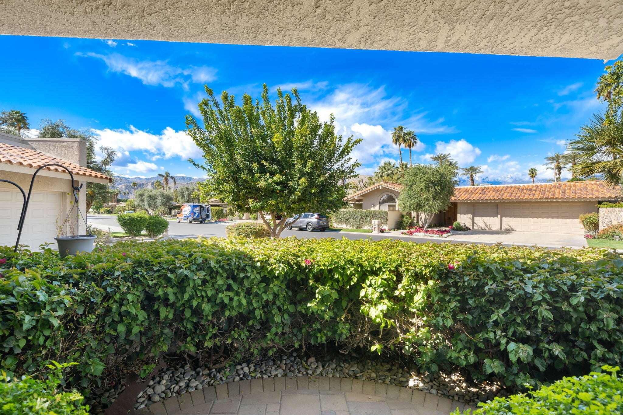 140 Columbia Drive Rancho Mirage, CA 92270 - Photo 11 of 31 a view of a yard with swimming pool