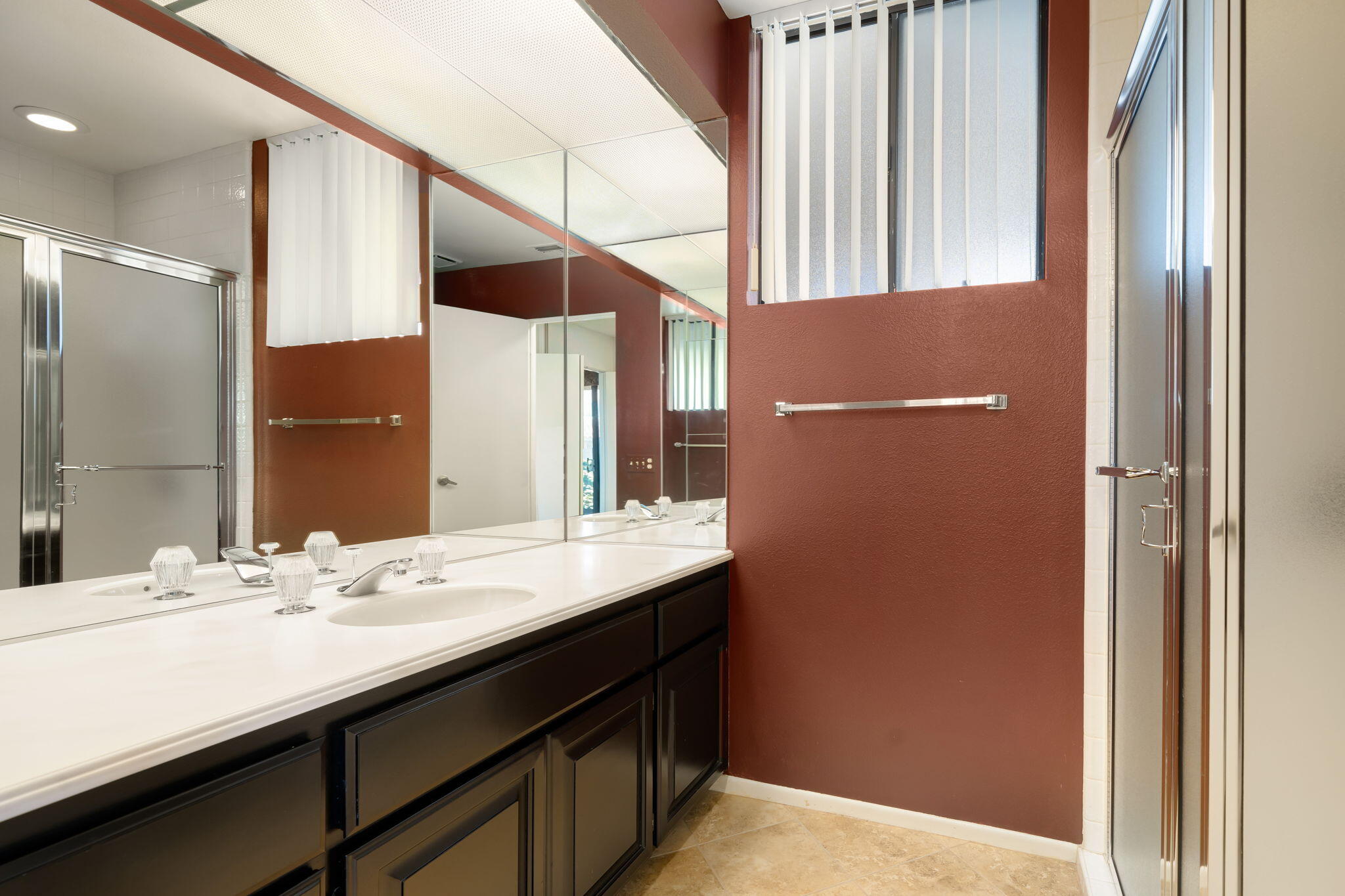140 Columbia Drive Rancho Mirage, CA 92270 - Photo 13 of 31 a bathroom with a sink and a mirror