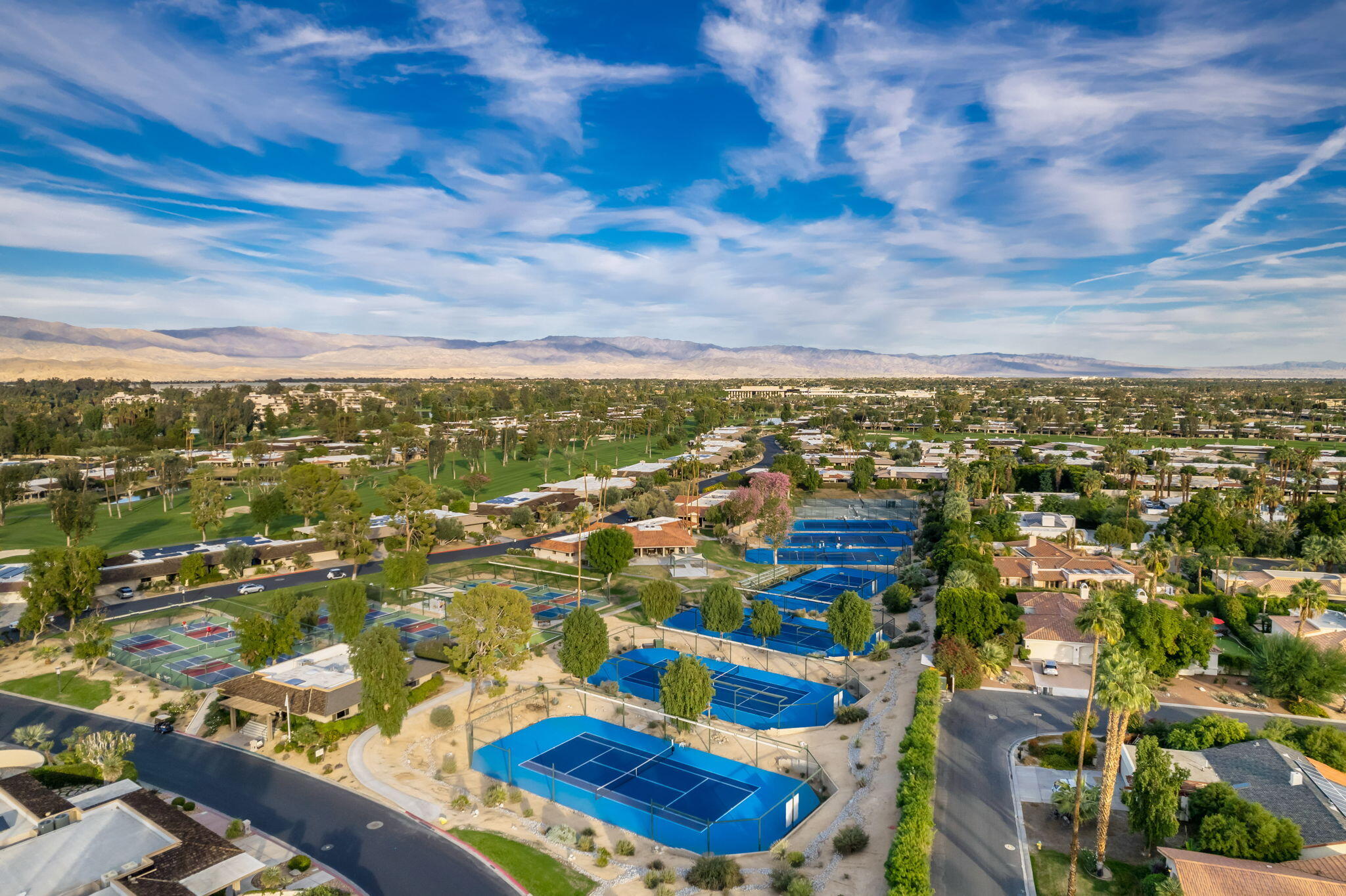 140 Columbia Drive Rancho Mirage, CA 92270 - Photo 25 of 31 an aerial view of residential houses with outdoor space