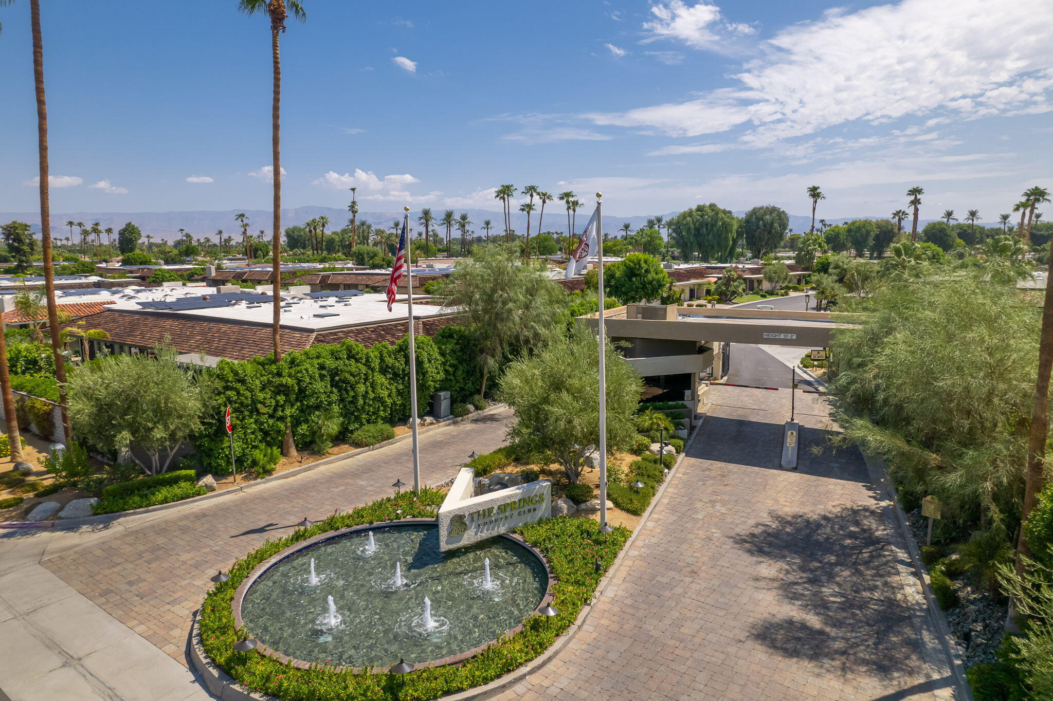 140 Columbia Drive Rancho Mirage, CA 92270 - Photo 27 of 31 a view of a swimming pool with outdoor seating and plants