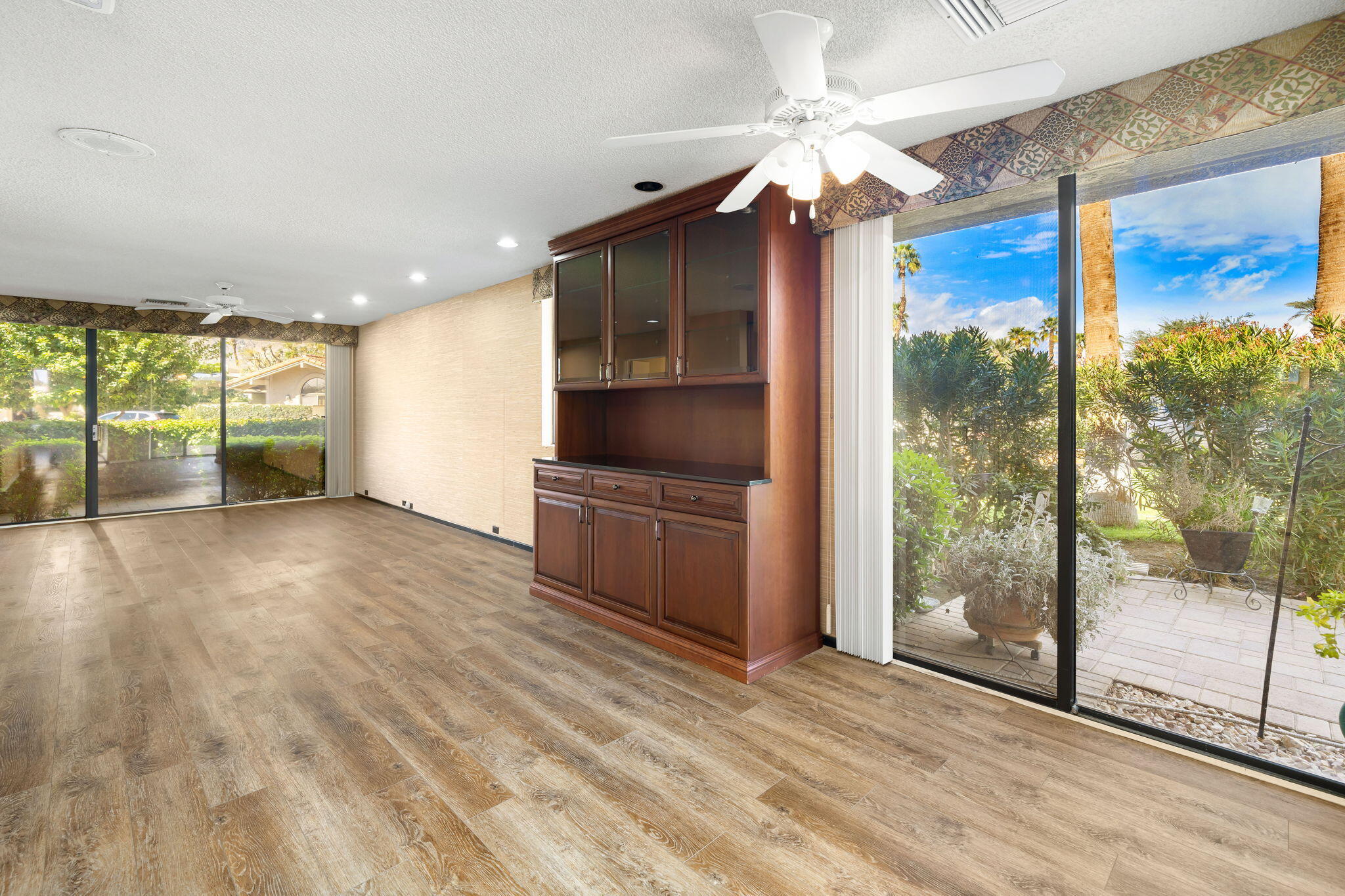 140 Columbia Drive Rancho Mirage, CA 92270 - Photo 10 of 31 a view of an empty room with a window