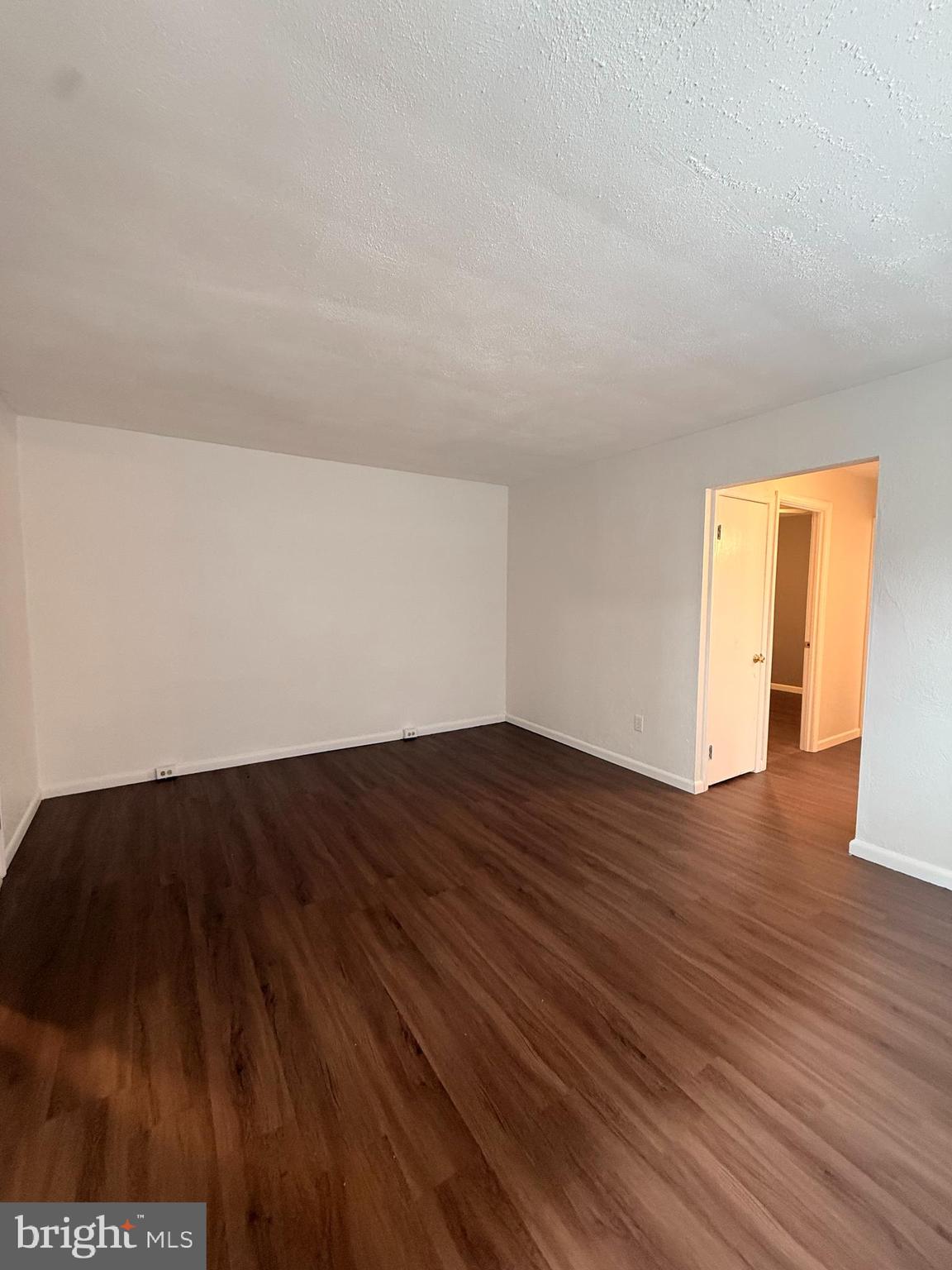 216 Boro Road, Unit A Secane, PA 19018 - Photo 17 of 26 a view of an empty room and wooden floor