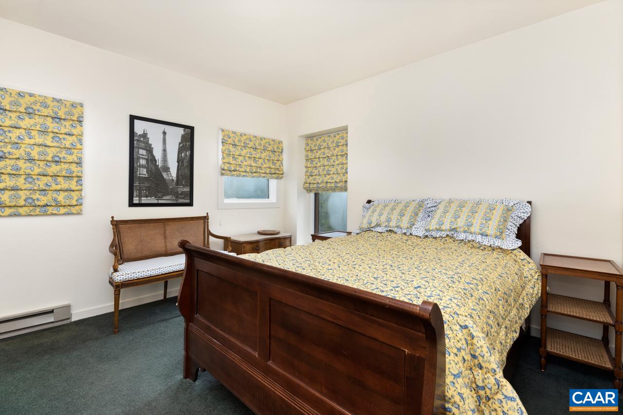 1706 High Ridge Wintergreen, VA 22967 - Photo 18 of 36 a bedroom with a bed and wooden floor