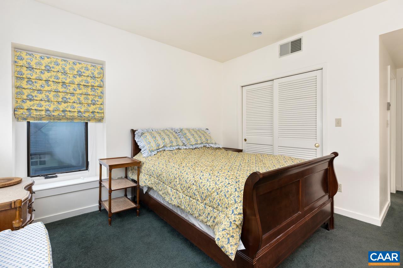 1706 High Ridge Wintergreen, VA 22967 - Photo 19 of 36 a bed sitting in a bedroom next to a window