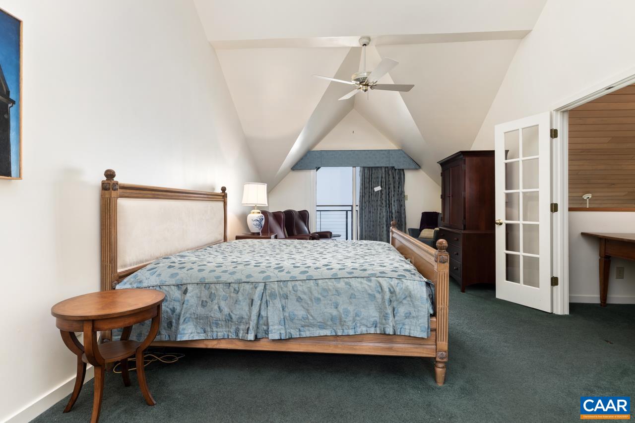 1706 High Ridge Wintergreen, VA 22967 - Photo 28 of 36 a bedroom with a bed table and chair