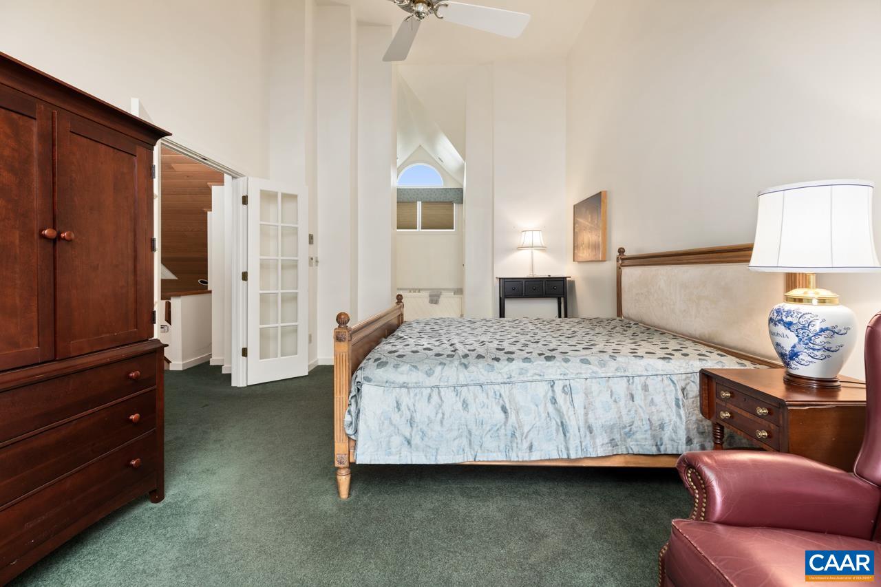 1706 High Ridge Wintergreen, VA 22967 - Photo 30 of 36 a bedroom with a bed and a night stand