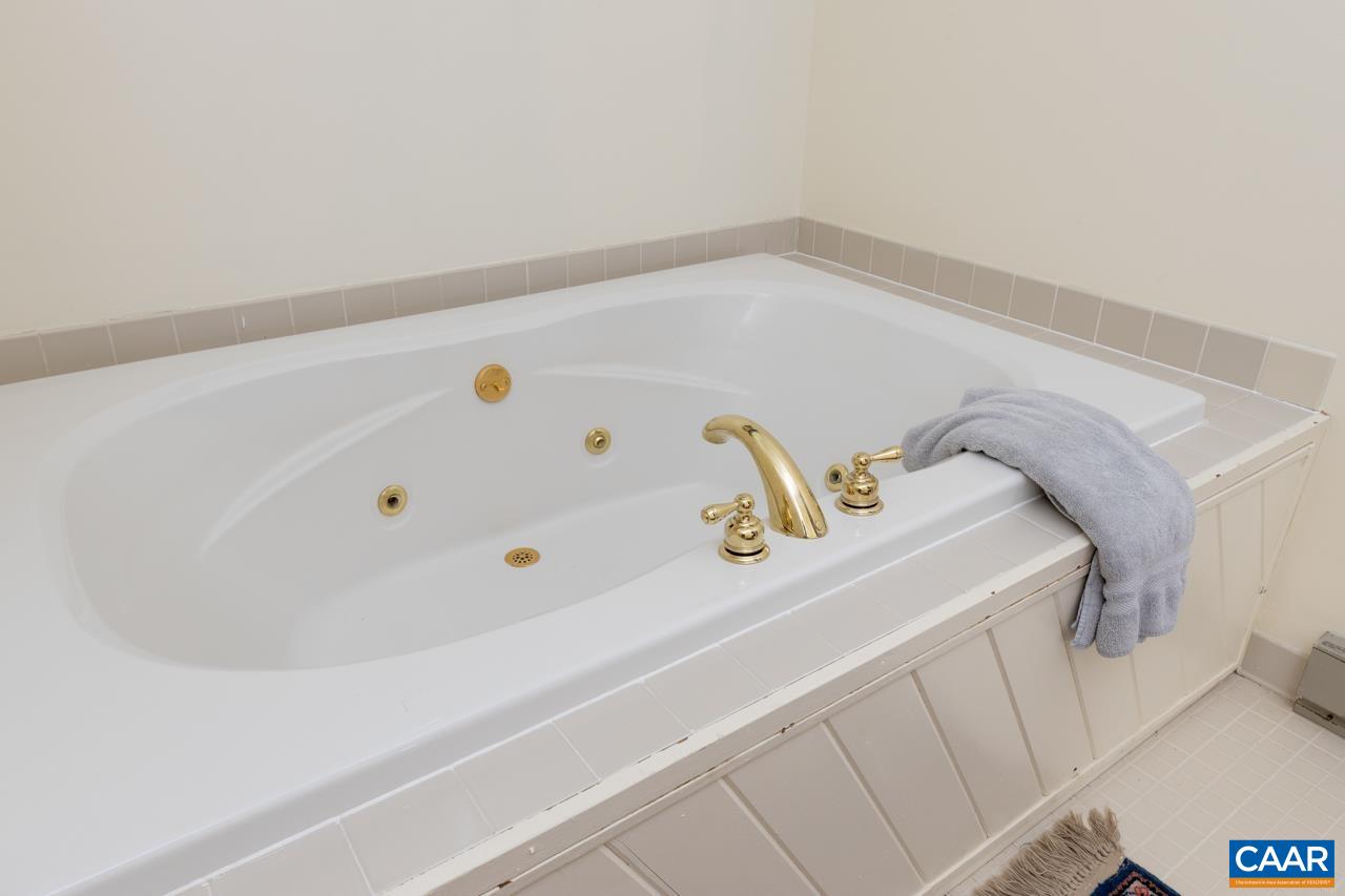 1706 High Ridge Wintergreen, VA 22967 - Photo 32 of 36 a bathroom with a tub