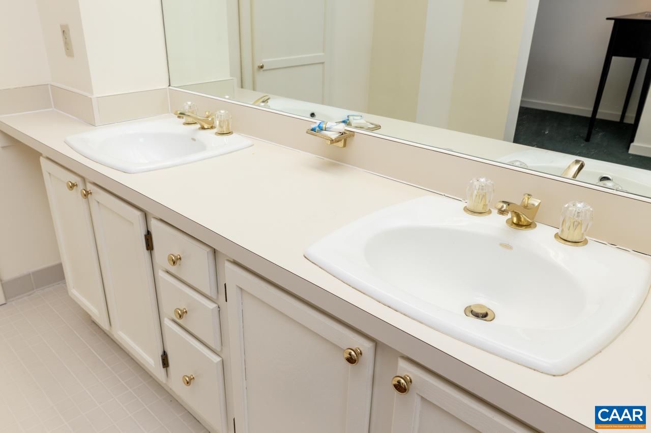 1706 High Ridge Wintergreen, VA 22967 - Photo 34 of 36 a bathroom with a sink and a mirror