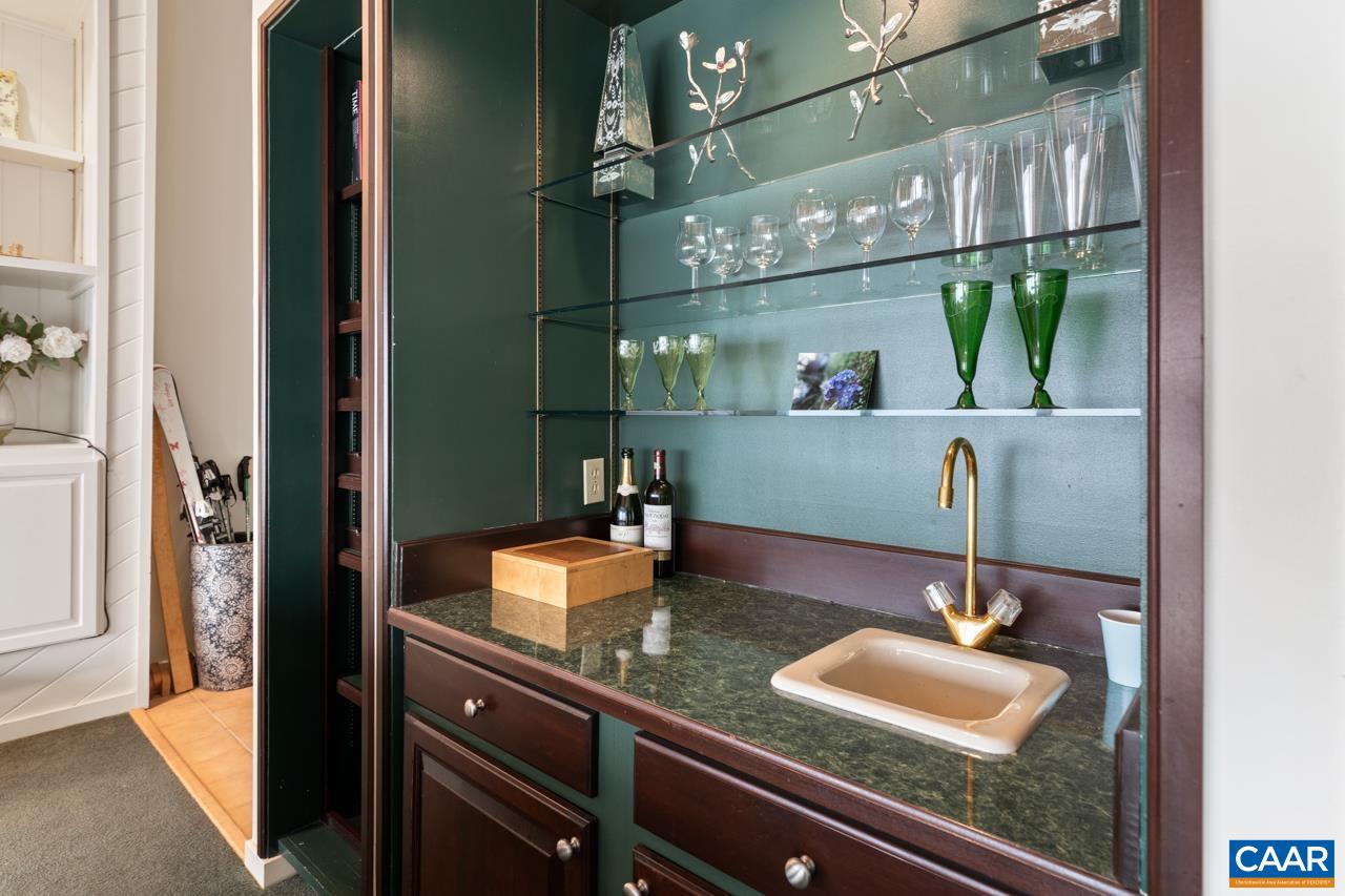 1706 High Ridge Wintergreen, VA 22967 - Photo 8 of 36 a bathroom with a sink and a mirror