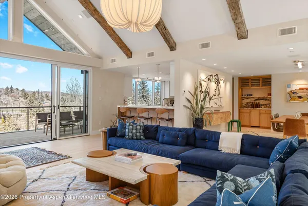a kitchen with stainless steel appliances granite countertop a sink and a stove