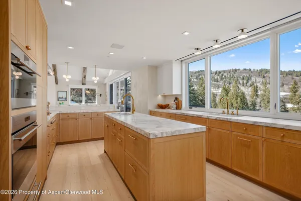 a bathroom with a tub and sink