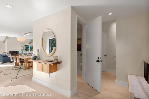 a living room with furniture a window and a fireplace