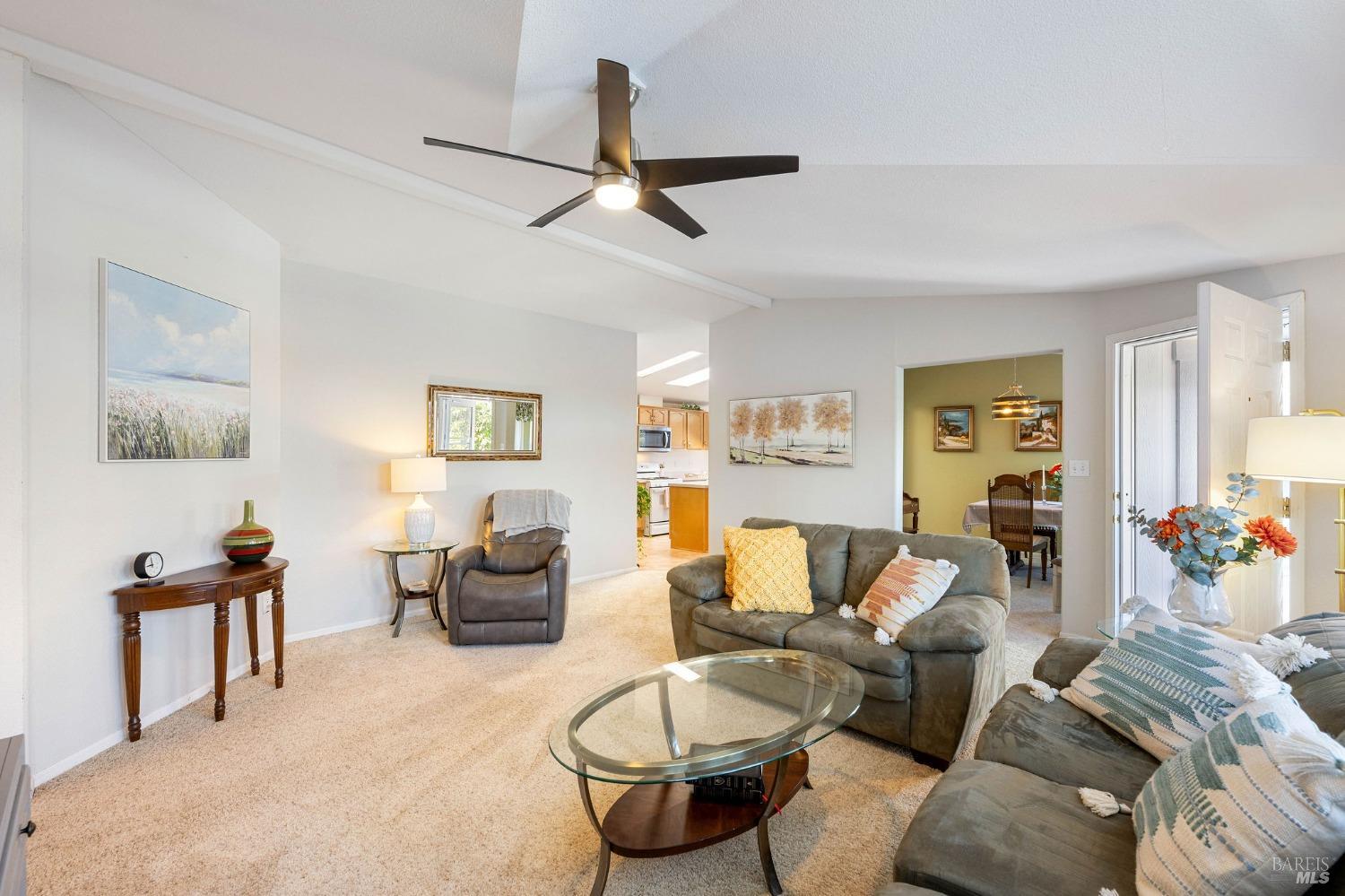 6468 Washington Street, Unit 16 Yountville, CA 94599 - Photo 11 of 45 a living room with furniture and a wooden floor