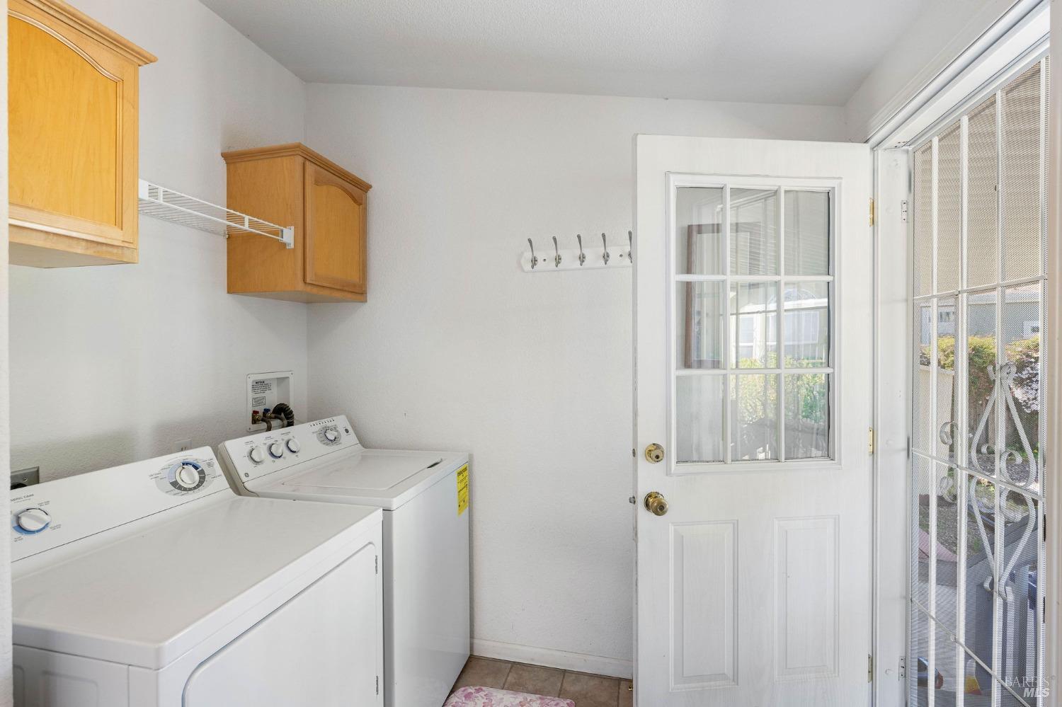 6468 Washington Street, Unit 16 Yountville, CA 94599 - Photo 23 of 45 a utility room with dryer and washer
