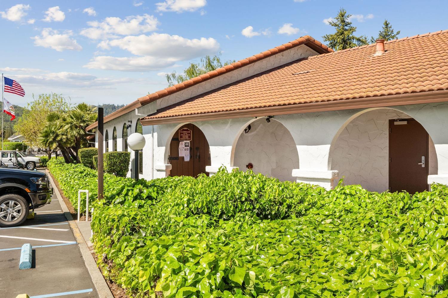 6468 Washington Street, Unit 16 Yountville, CA 94599 - Photo 36 of 45 a front view of a house with garden