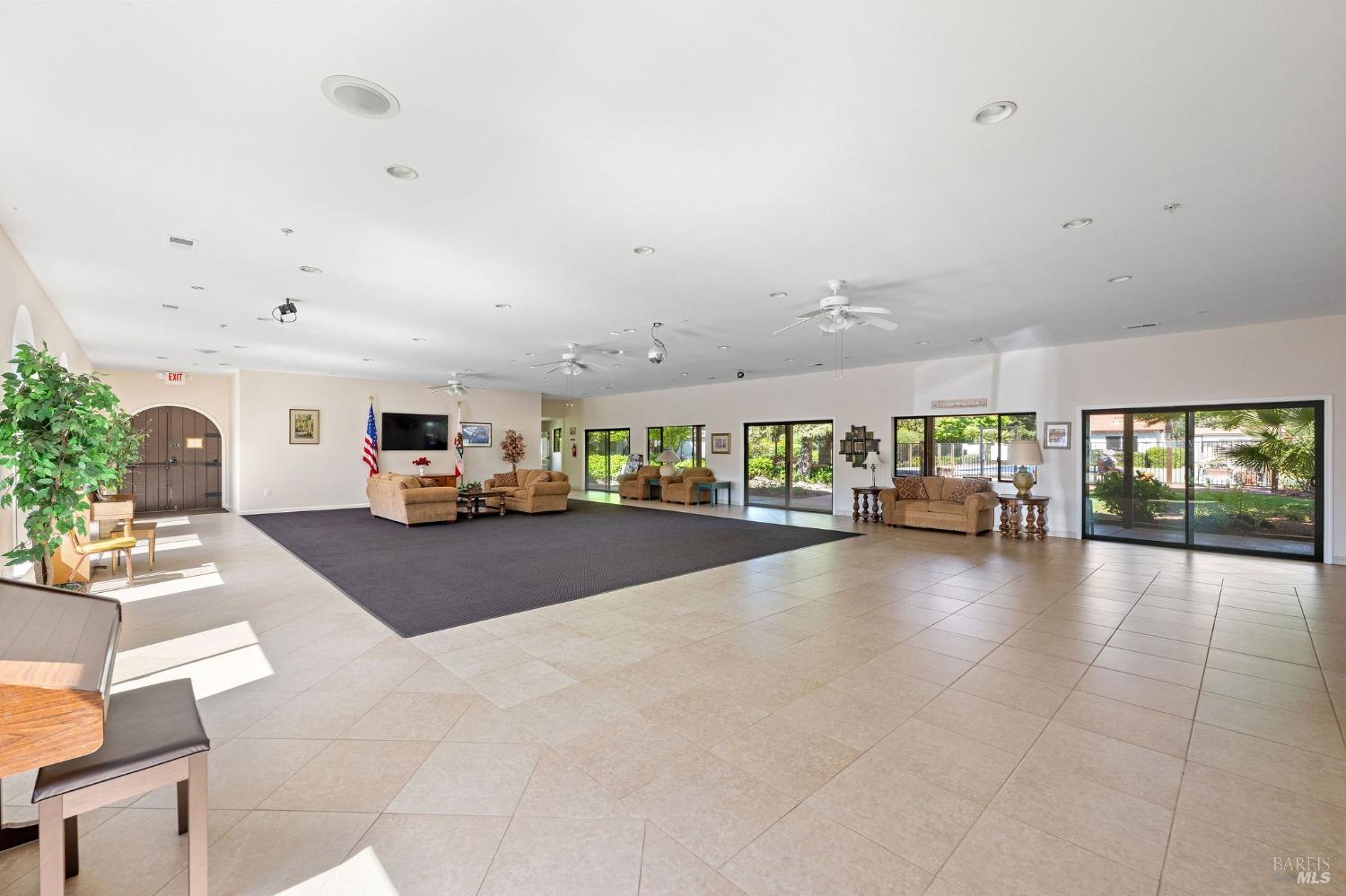 6468 Washington Street, Unit 16 Yountville, CA 94599 - Photo 39 of 45 a room with lots of counter top space and a wooden floor