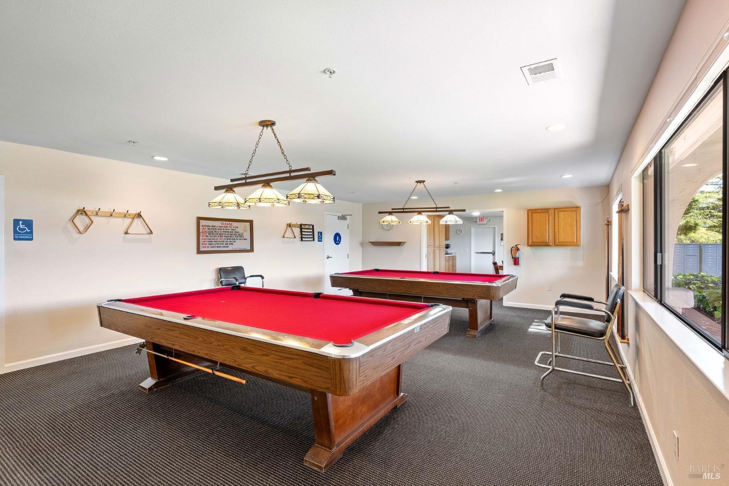 6468 Washington Street, Unit 16 Yountville, CA 94599 - Photo 41 of 45 a room with pool table and windows