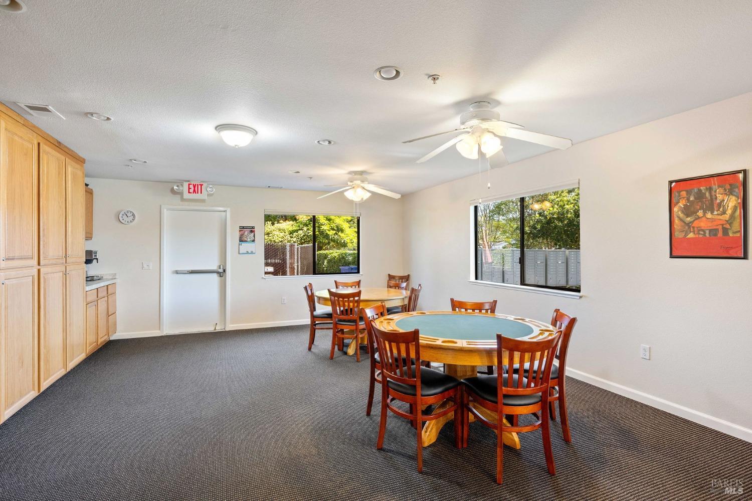 6468 Washington Street, Unit 16 Yountville, CA 94599 - Photo 42 of 45 a view of a dining room with furniture and a chandelier