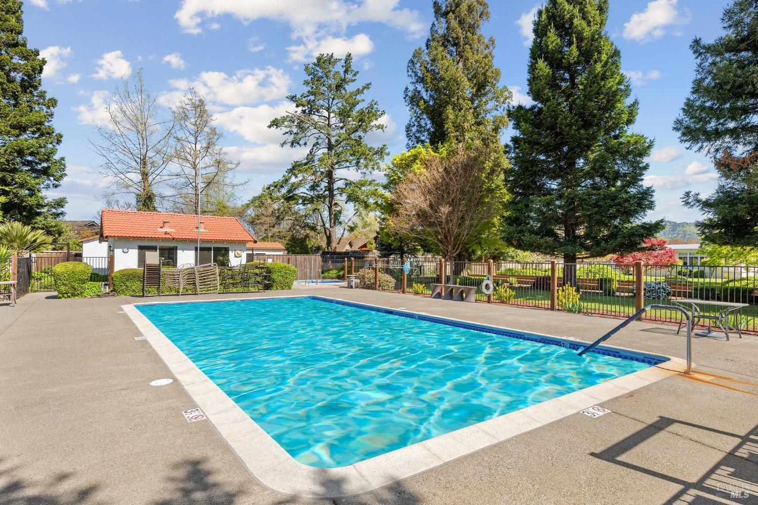 6468 Washington Street, Unit 16 Yountville, CA 94599 - Photo 43 of 45 a view of a swimming pool with a patio