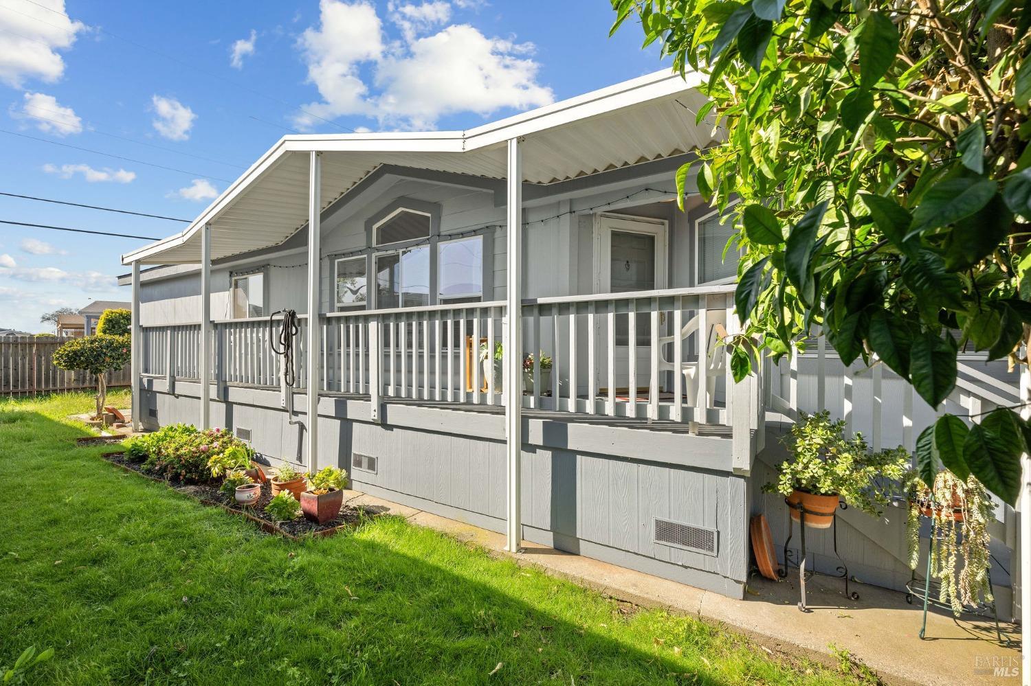 6468 Washington Street, Unit 16 Yountville, CA 94599 - Photo 5 of 45 a view of a chair and table in the garden