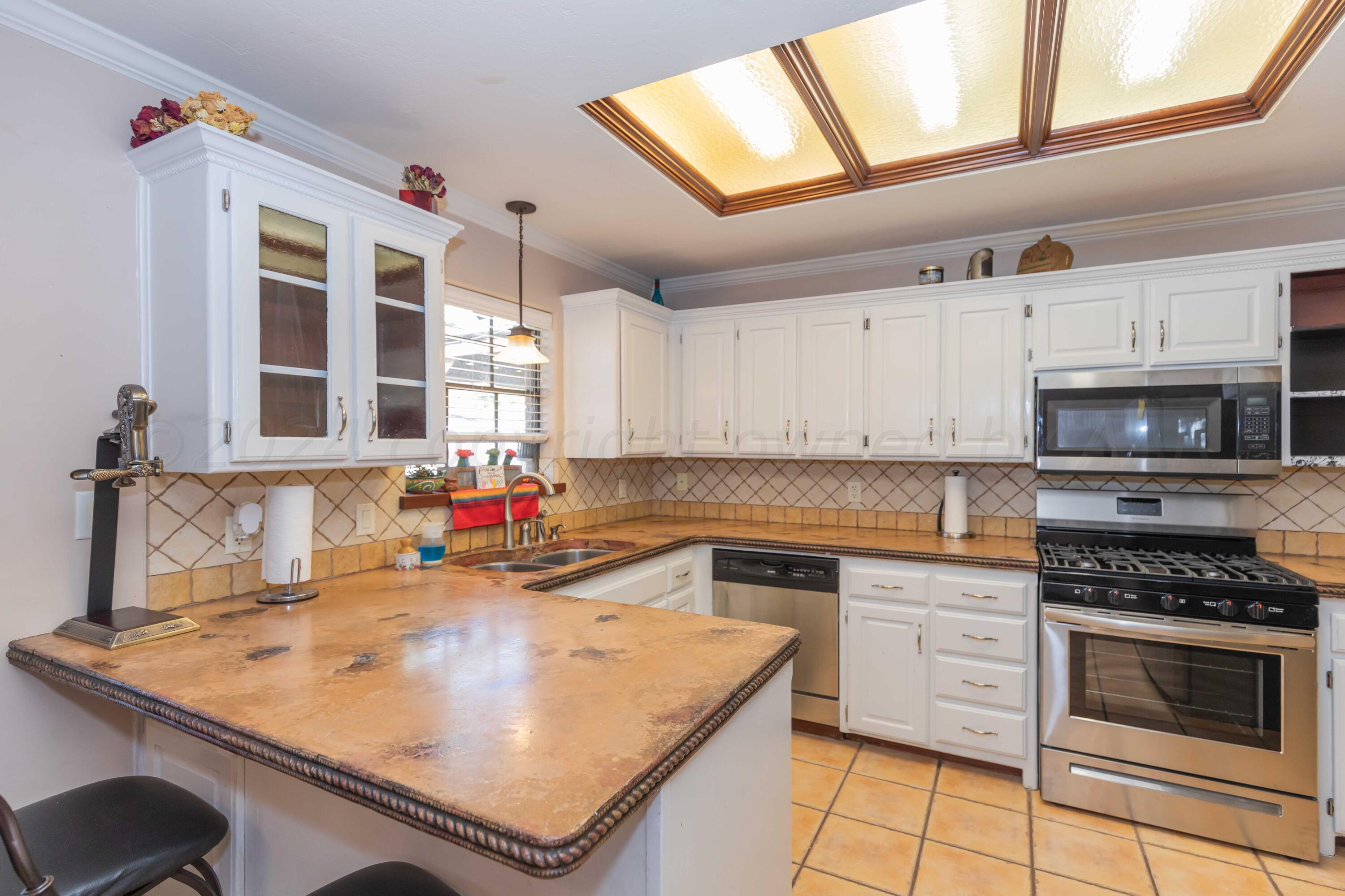 5252 Capulin Lane Amarillo, TX 79110 - Photo 8 of 37 KITCHEN VIEW 1