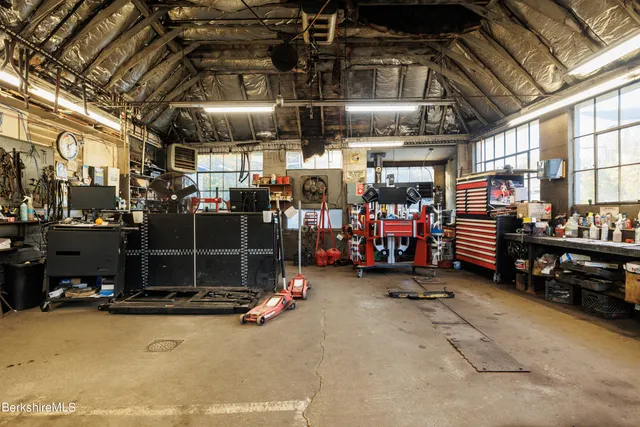 a car is parked in front of a building