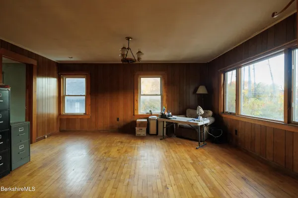 a kitchen with stainless steel appliances a stove a sink and a microwave