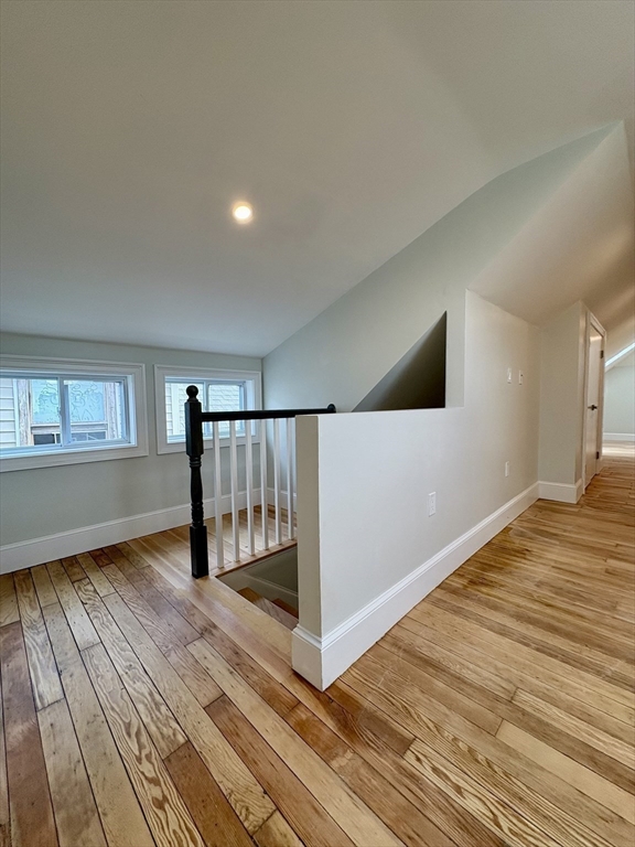 54 Falcon Street, Unit 2 Boston, MA 02128 - Photo 16 of 21 a view of a livingroom with wooden floor