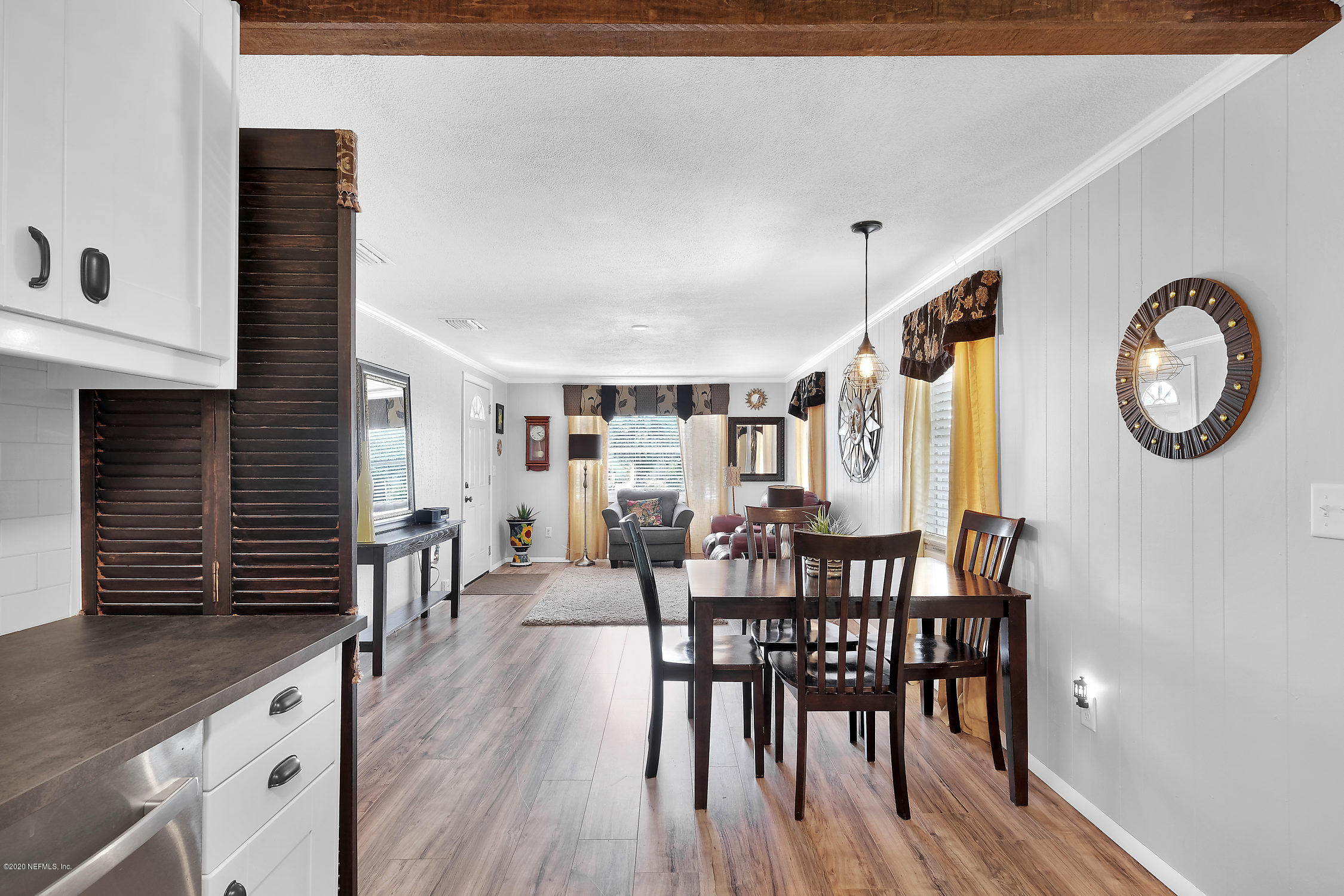 890 Palermo Road St. Augustine, FL 32086 - Photo 12 of 25 a dining room with furniture and wooden floor