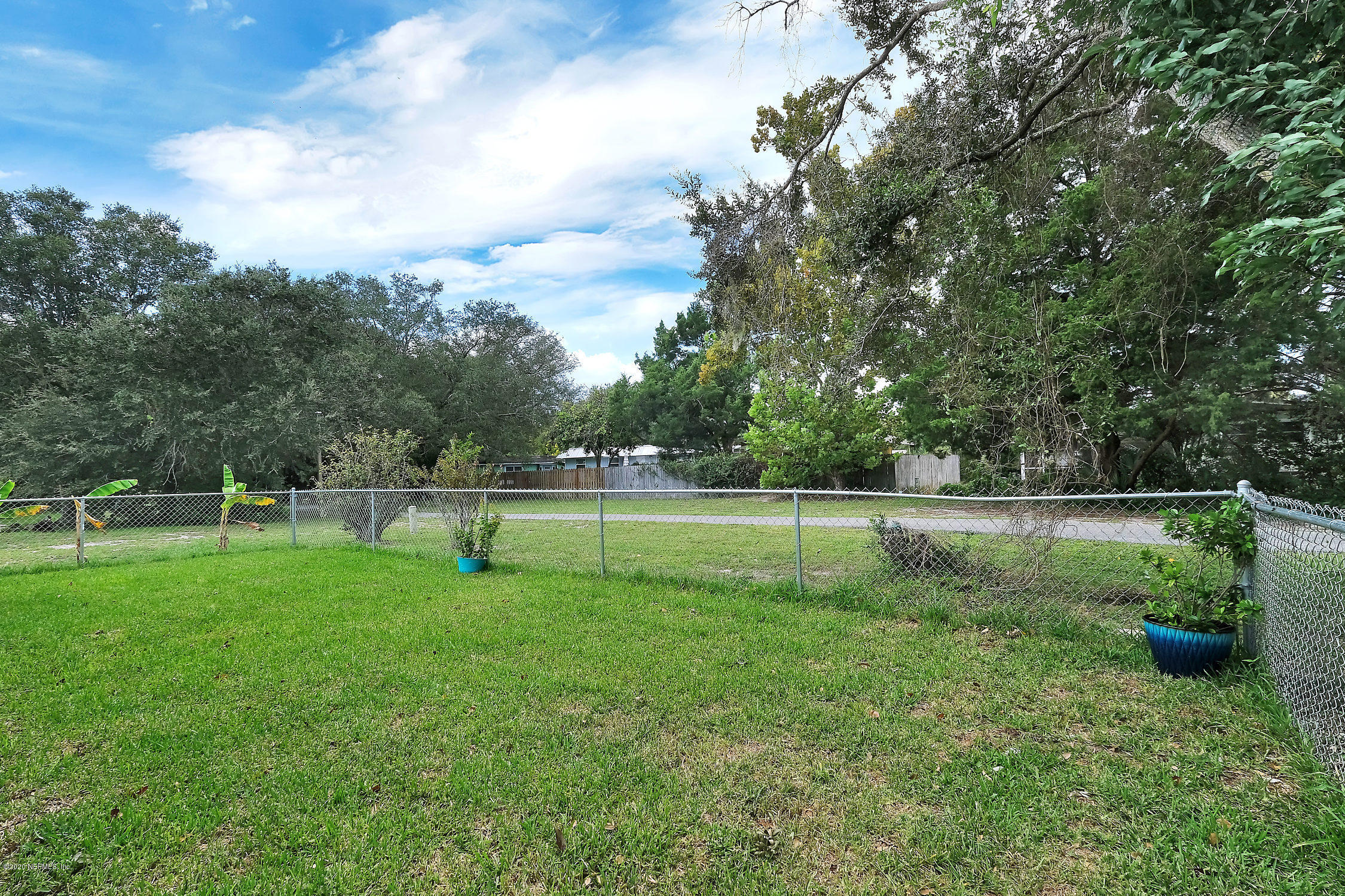 890 Palermo Road St. Augustine, FL 32086 - Photo 20 of 25 a view of a garden with a slide