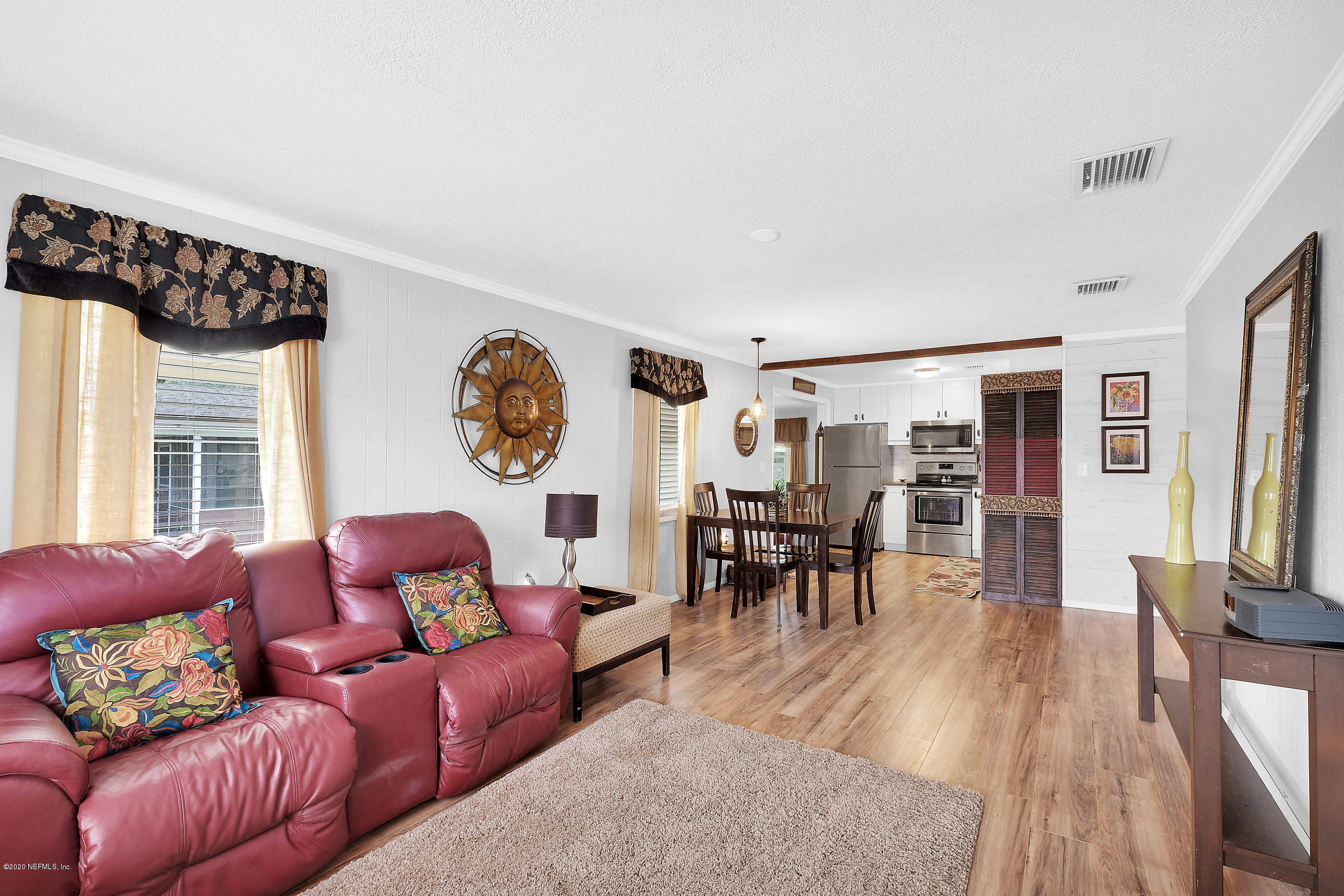 890 Palermo Road St. Augustine, FL 32086 - Photo 7 of 25 a living room with furniture and a large window