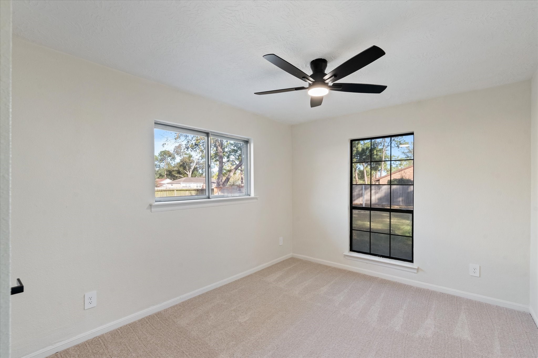 10403 Winding Trail Road La Porte, TX 77571 - Photo 22 of 26 a view of an empty room with a window