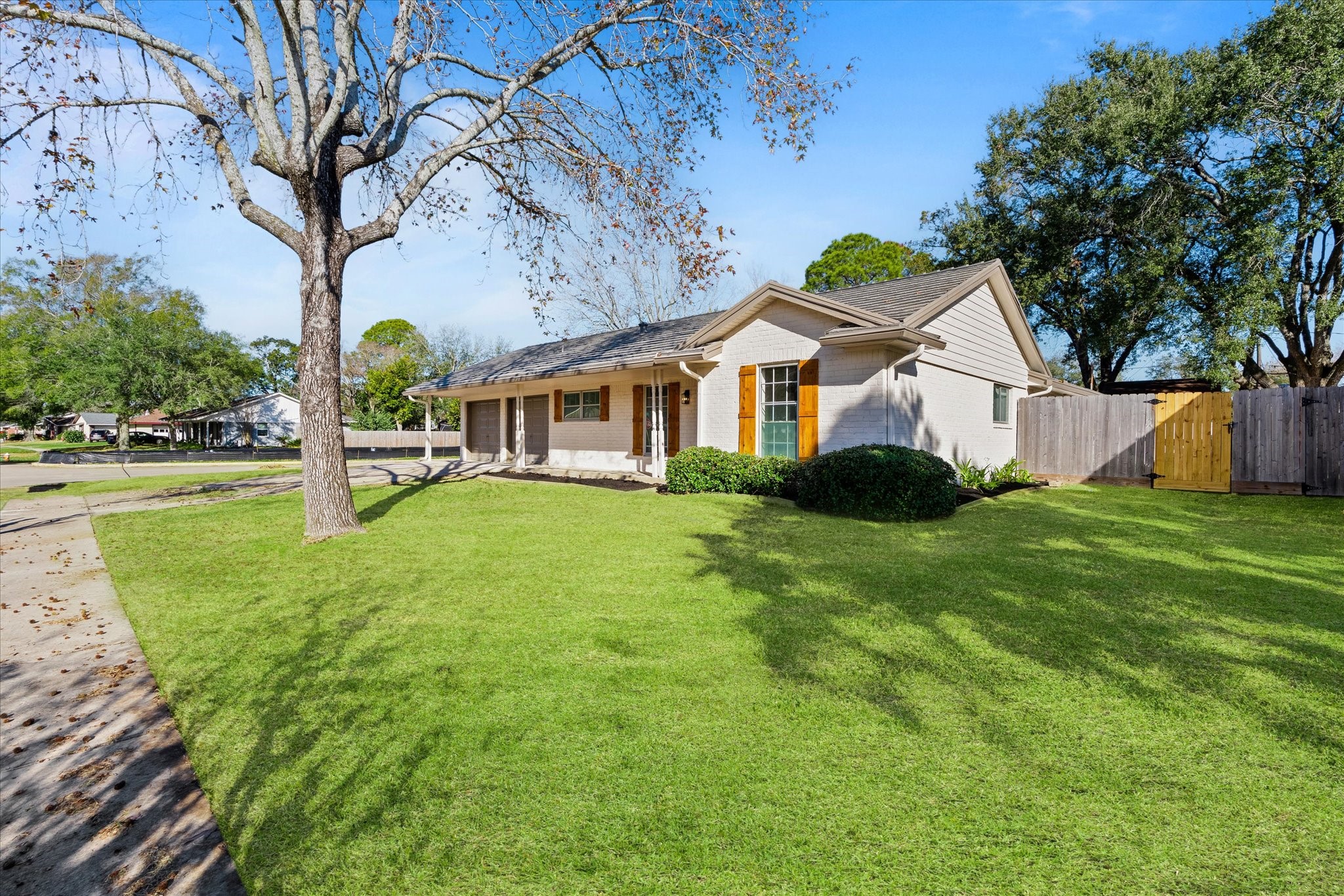 10403 Winding Trail Road La Porte, TX 77571 - Photo 5 of 26 a front view of house with yard and green space