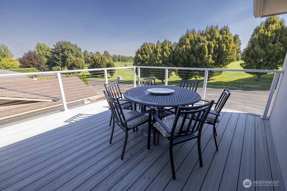 2425 Country Club Road Walla Walla, WA 99362 - Photo 30 of 39 a view of a chairs and table on the wooden deck