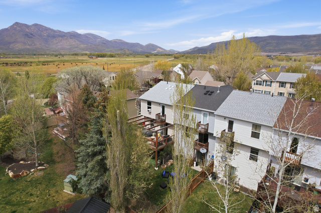515 Inverness Lane, Unit 207 Heber City, UT 84032 - Photo 25 of 26 Aerial view of residential area featuring a mountain backdrop