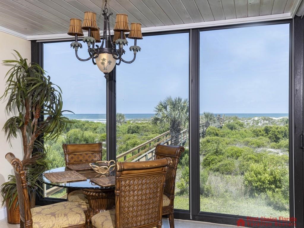 a view of a livingroom with furniture and window