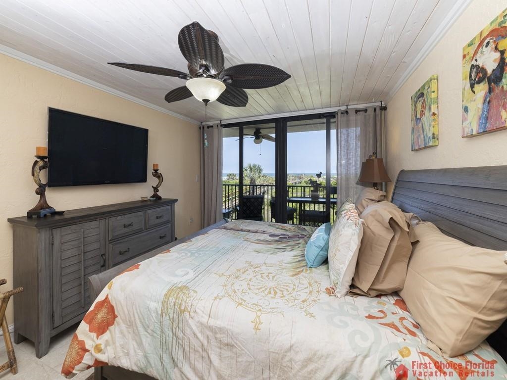 1 Dondanville Road, Unit 109B St. Augustine, FL 32080 - Photo 11 of 27 a bedroom with a bed and a flat screen tv