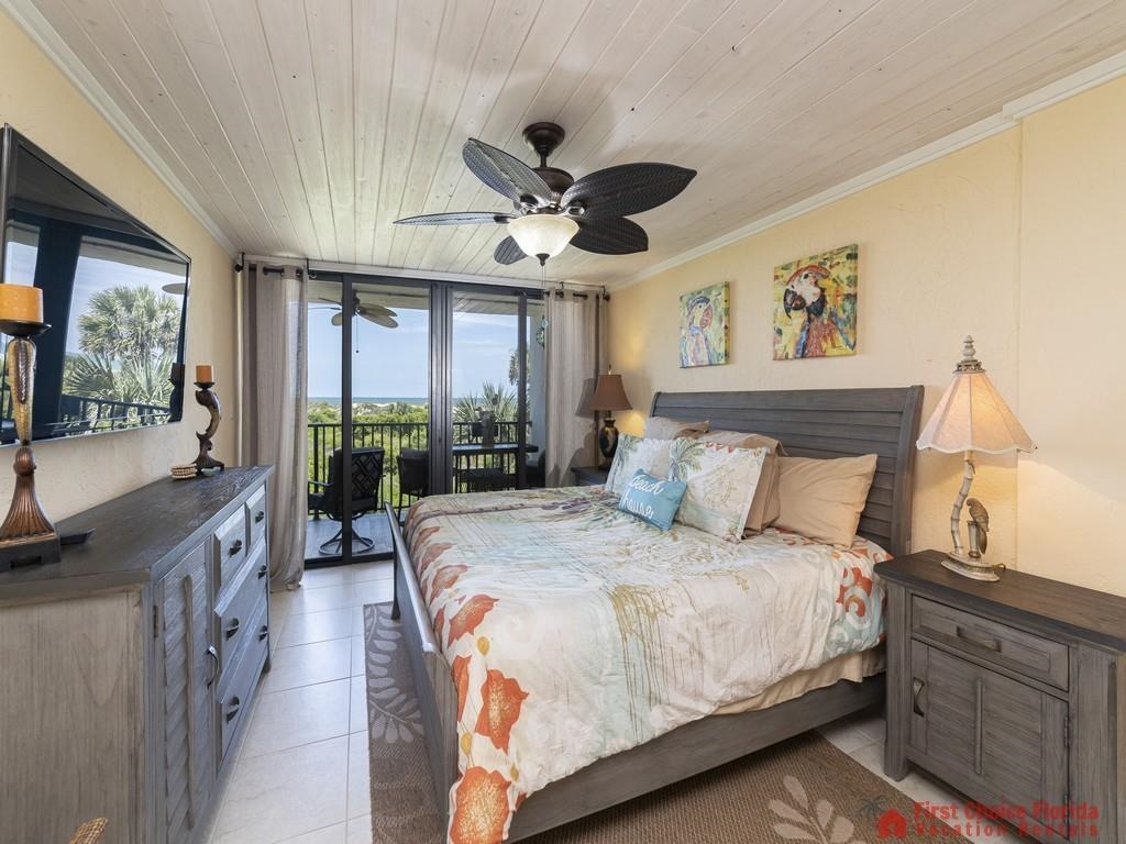 1 Dondanville Road, Unit 109B St. Augustine, FL 32080 - Photo 14 of 27 a spacious bedroom with a large bed and a large window