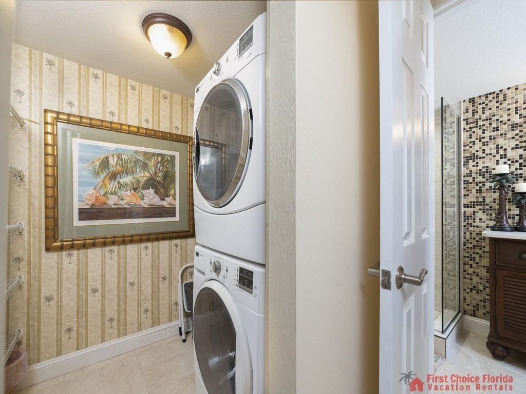 1 Dondanville Road, Unit 109B St. Augustine, FL 32080 - Photo 22 of 27 a view of a hallway with washer and dryer