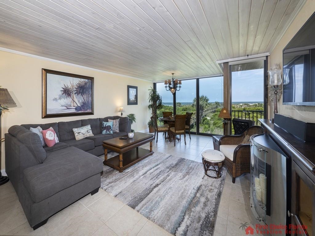 1 Dondanville Road, Unit 109B St. Augustine, FL 32080 - Photo 4 of 27 a living room with furniture and a large window