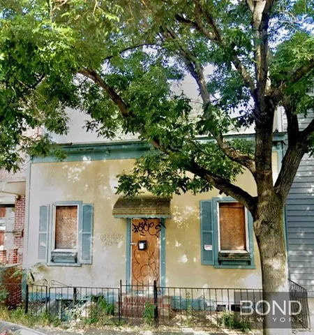 a front view of a house with lake view