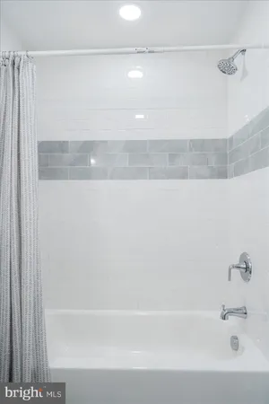 a bathroom with a bathtub