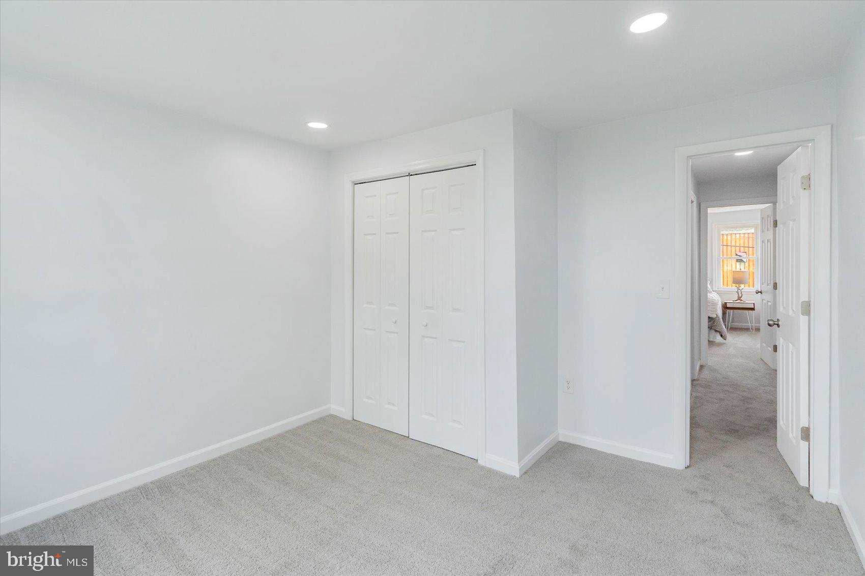 1432 Carroll Street Baltimore, MD 21230 - Photo 19 of 29 an empty room with an entryway