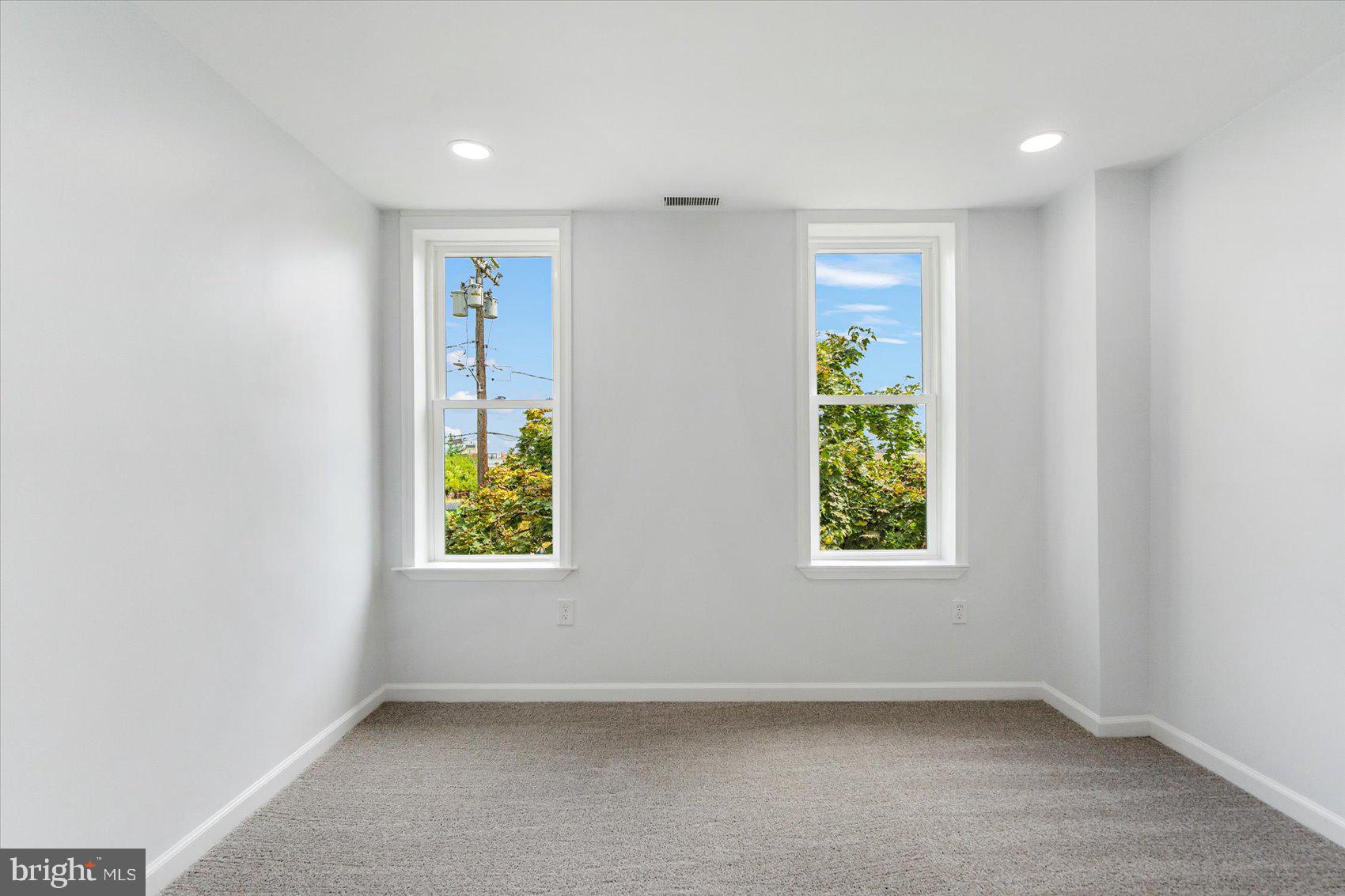 1432 Carroll Street Baltimore, MD 21230 - Photo 21 of 29 an empty room with windows