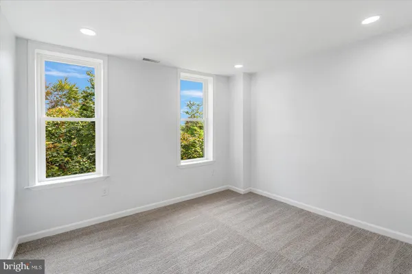 an empty room with windows